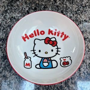 Hello kitty pasta bowl wearing vintage outfit from March 1975 first appearance